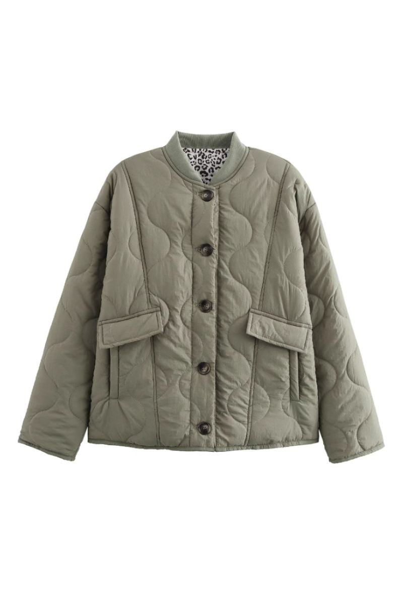 Dame jakke | Quiltet jakke med mønstrede ærmer og knapper