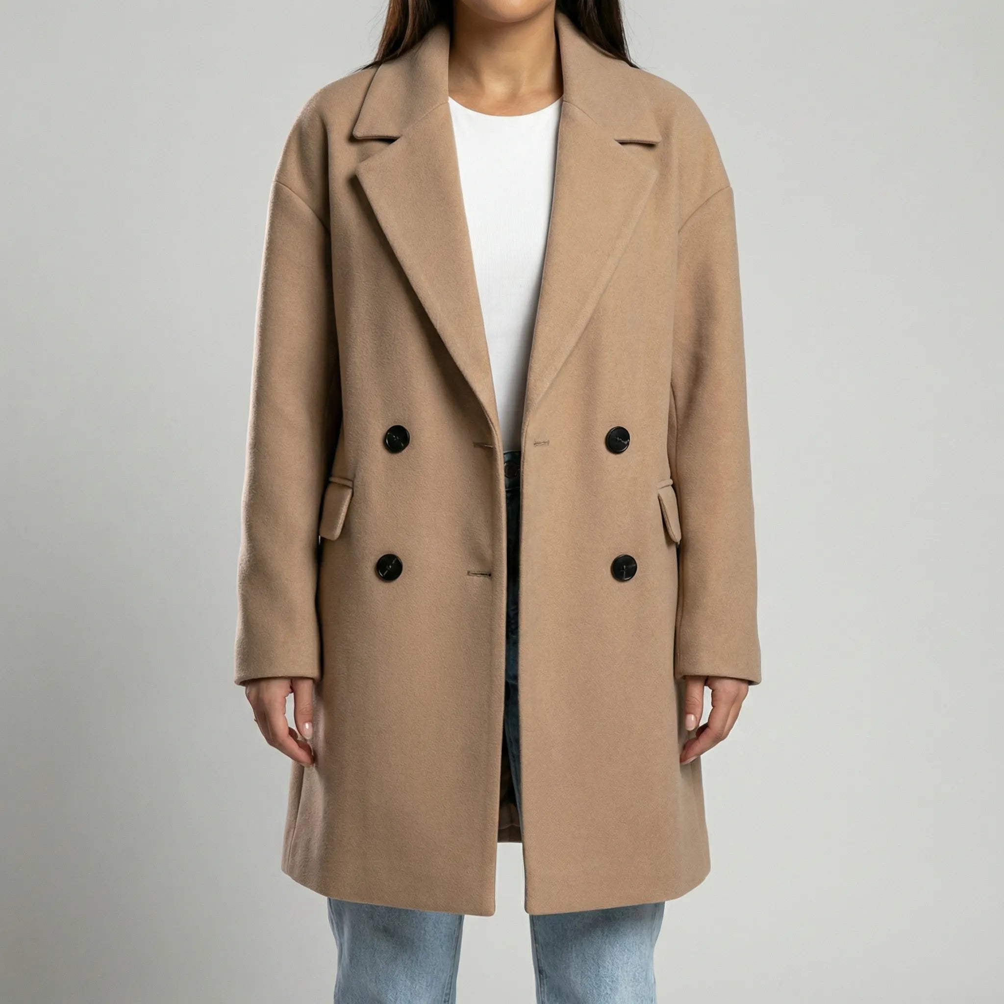 Lang damefrakke | Ulden frakke med knapper og reverskrave