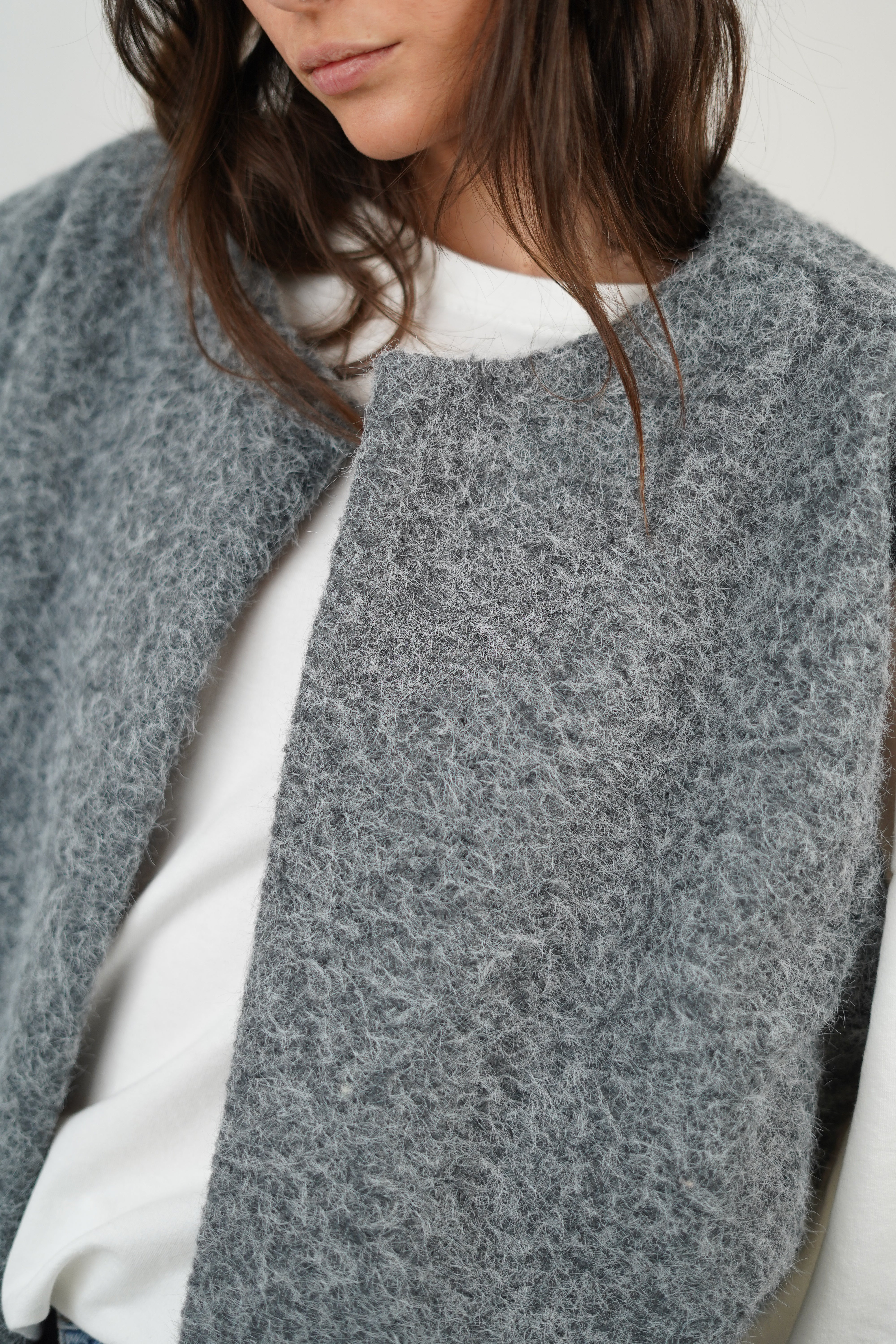 Dame vest | Langt strikvest uden ærmer