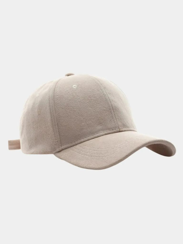 Elegant ensfarvet cap i blødt tekstil – justerbar pasform